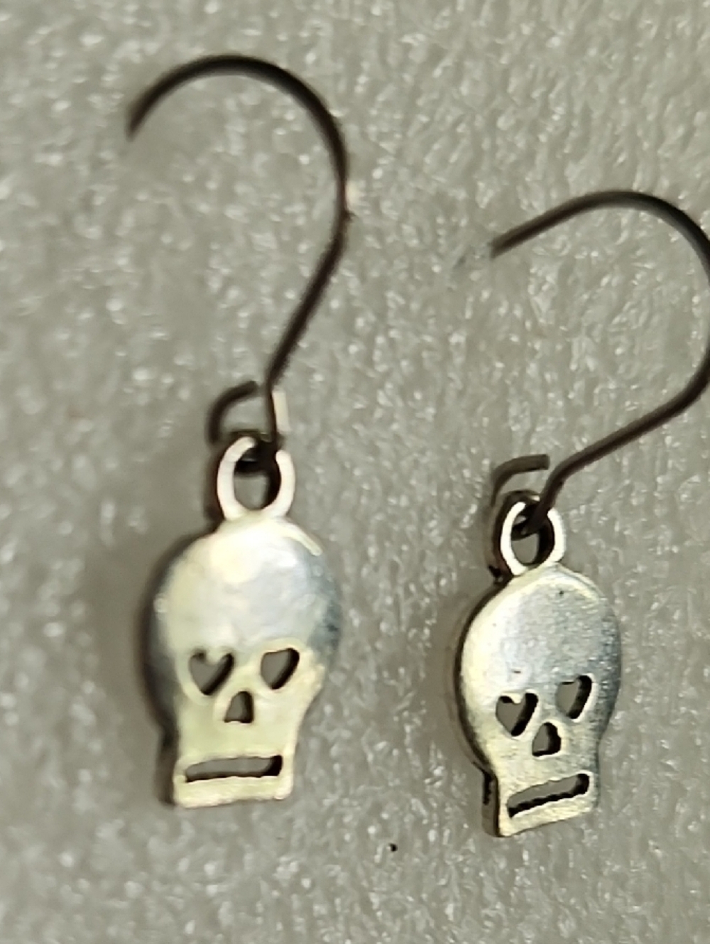 Hand Crafted Silver Skull Earrings with Heart Eye Cutouts